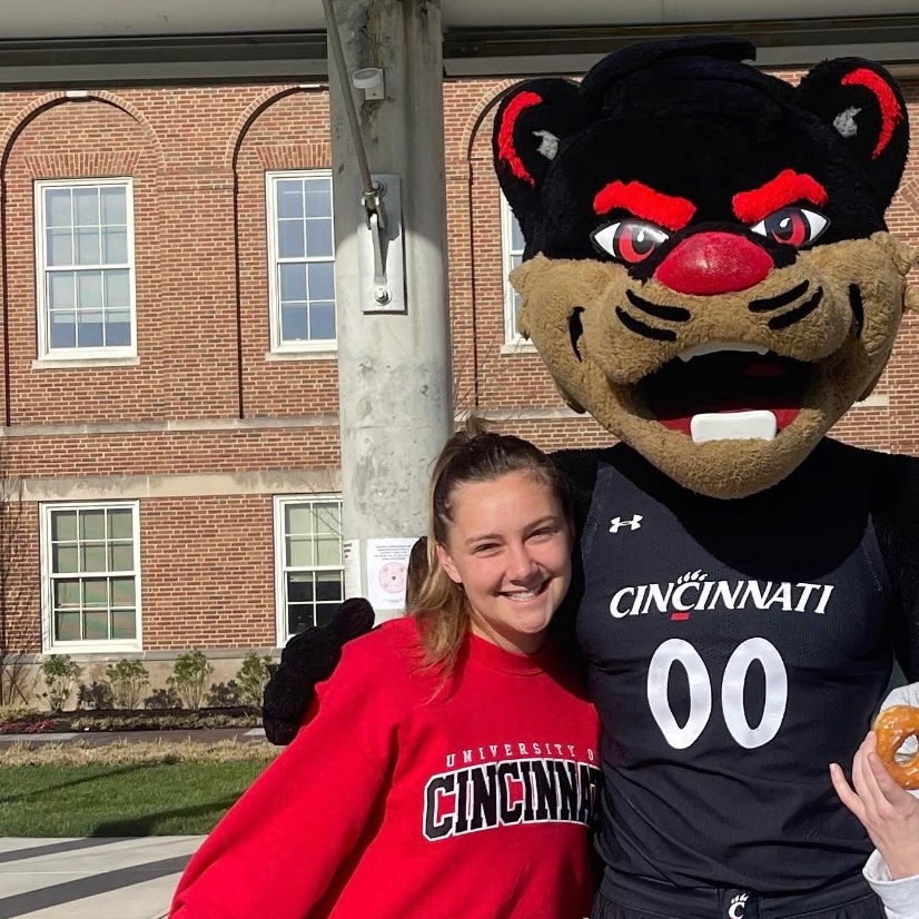 Grace Allen, 4th year, Health Sciences - Pre-PT Major hugs bearcat