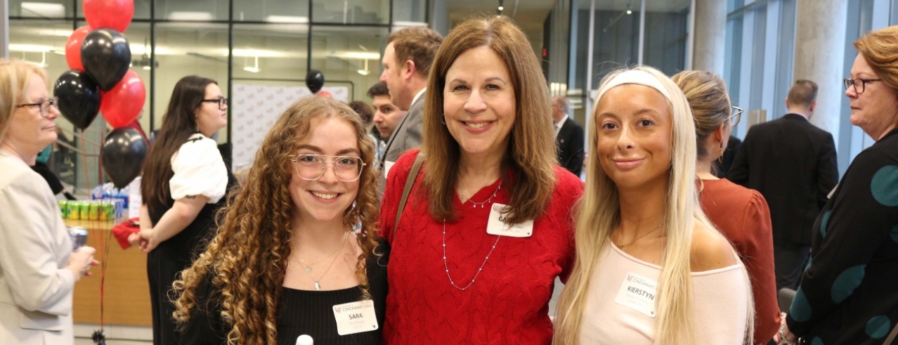 Students with a faculty member at the College of Allied Health Sciences Scholarship Reception.