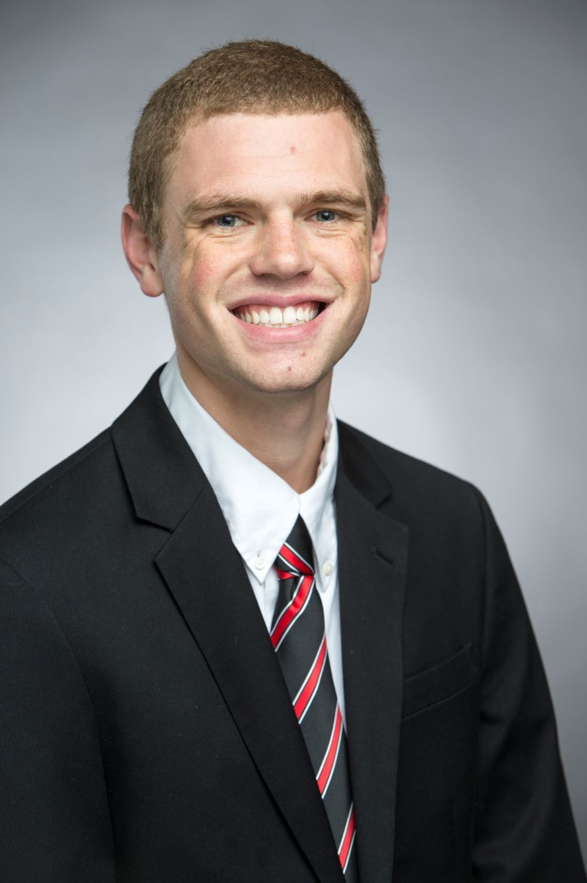 headshot of Aaron